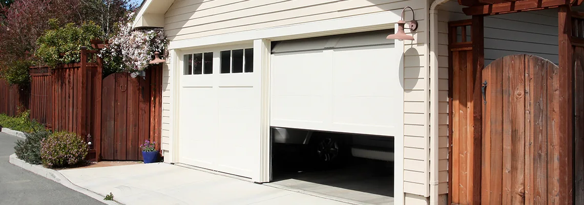 Fix Metal Garage Door Jerking in Carbondale, Illinois